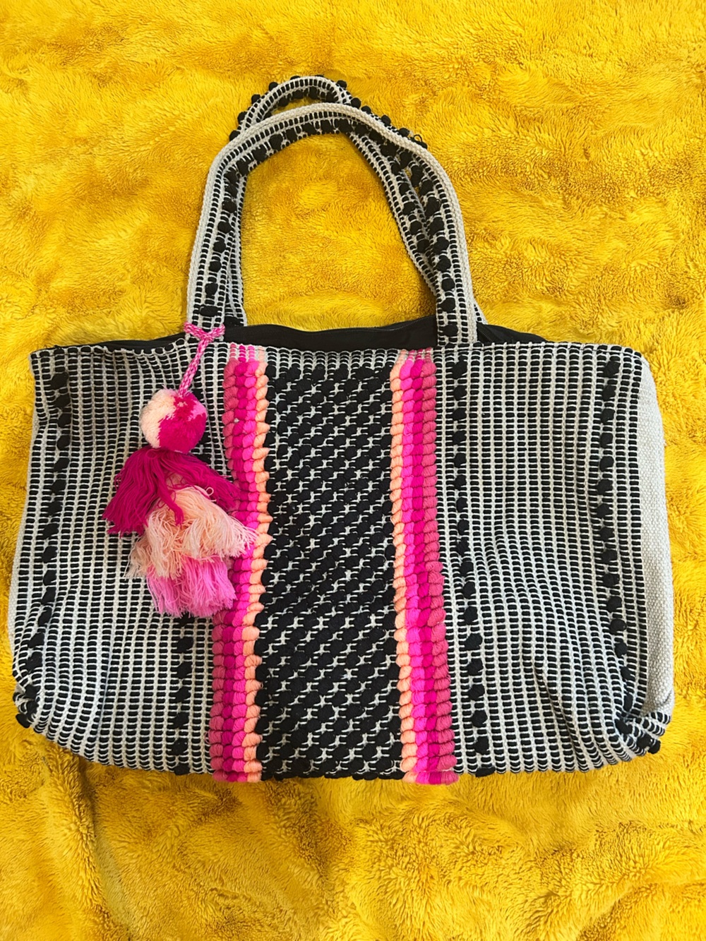 Black and Pink Woven Tote Bag with Pom Pom Accent EUC